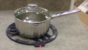 Heat indicator is set on the counters and then set the pot on placed on that. 